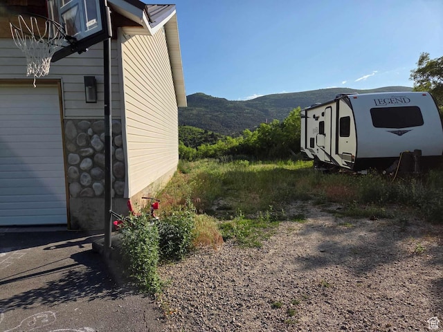 8375 E Lake Pines Dr Unit 212, Heber City, UT 84032 - view of property exterior featuring a mountain view