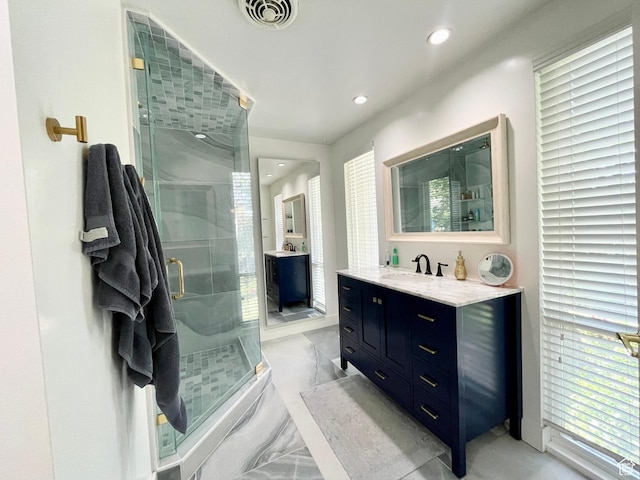 3411 E Enchanted View Dr S, Cottonwood Heights, UT 84121 - full bathroom with vanity, marble finish floors, a stall shower, and recessed lighting