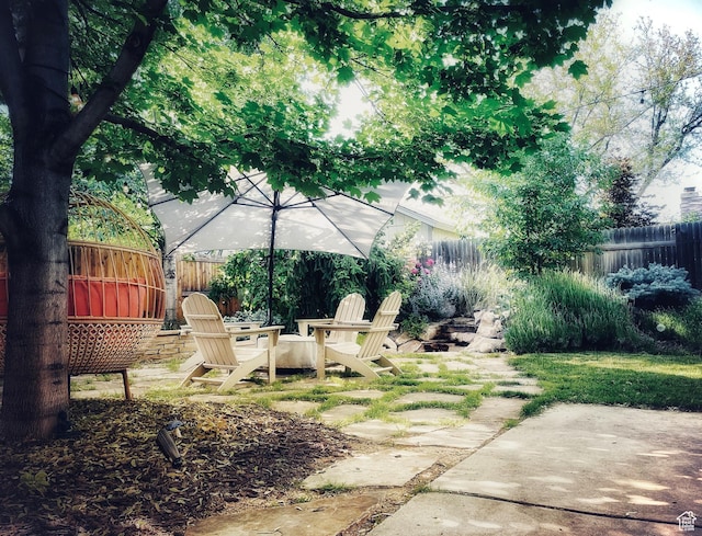3411 E Enchanted View Dr S, Cottonwood Heights, UT 84121 - fenced backyard featuring a patio