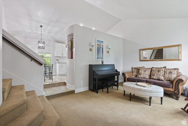 10787 S Pine Shadow Rd, South Jordan, UT 84009 - living area featuring stairway, light carpet, lofted ceiling, and light tile patterned flooring