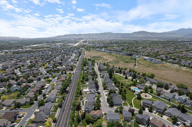 10787 S Pine Shadow Rd, South Jordan, UT 84009 - aerial overview of property's location with a mountain backdrop and nearby suburban area