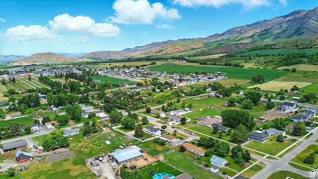 155 N 200 E, Richmond, UT 84333 - aerial overview of property's location featuring mountains