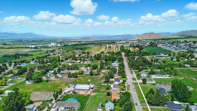 155 N 200 E, Richmond, UT 84333 - aerial perspective of suburban area with a mountain backdrop and property parcel outlined