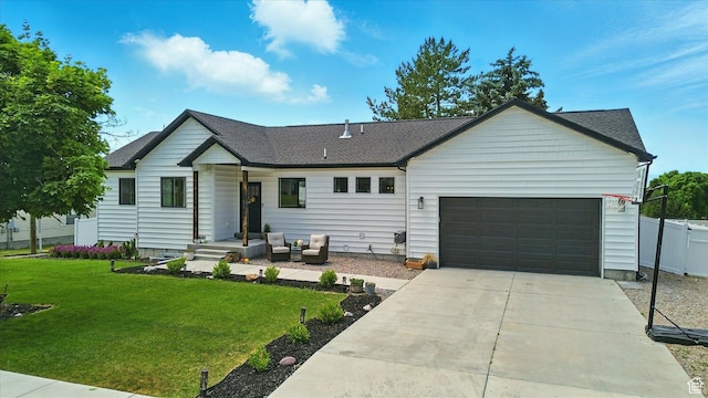 155 N 200 E, Richmond, UT 84333 - view of front of property featuring an attached garage, concrete driveway, and a shingled roof