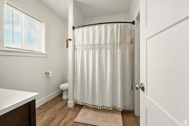 155 N 200 E, Richmond, UT 84333 - bathroom with vanity, wood finished floors, and a shower with curtain