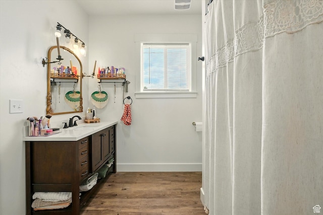 155 N 200 E, Richmond, UT 84333 - bathroom with wood finished floors and vanity