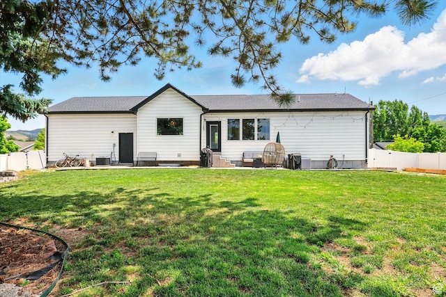 155 N 200 E, Richmond, UT 84333 - rear view of house featuring a fenced backyard and a patio area