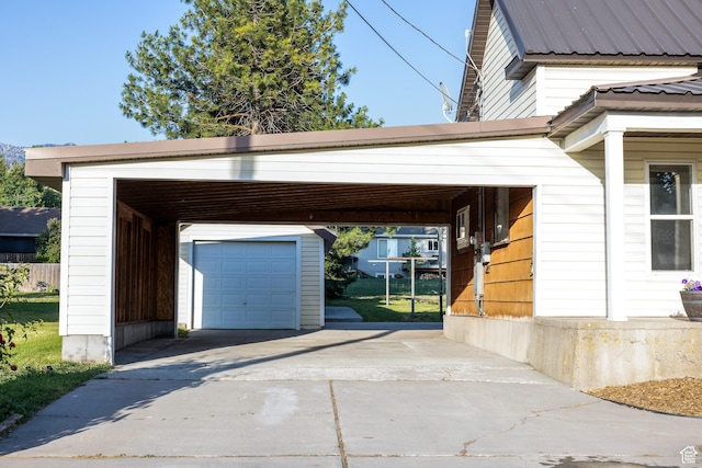 297 S 200 W, Richmond, UT 84333 - garage featuring driveway