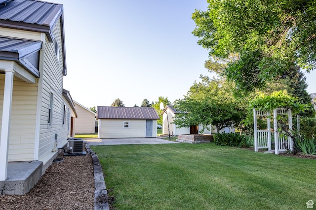 297 S 200 W, Richmond, UT 84333 - view of green lawn with a patio area and an outdoor structure