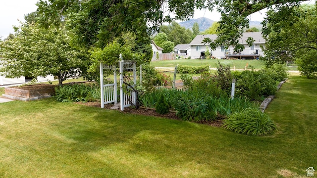 297 S 200 W, Richmond, UT 84333 - view of grassy yard with a mountain view