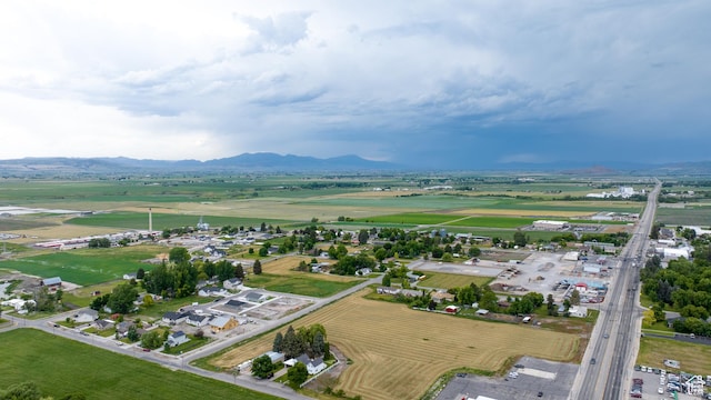 297 S 200 W, Richmond, UT 84333 - aerial view of property and surrounding area featuring a mountain backdrop