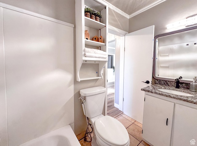 297 S 200 W, Richmond, UT 84333 - bathroom with ornamental molding, vanity, a tub to relax in, and tile patterned floors