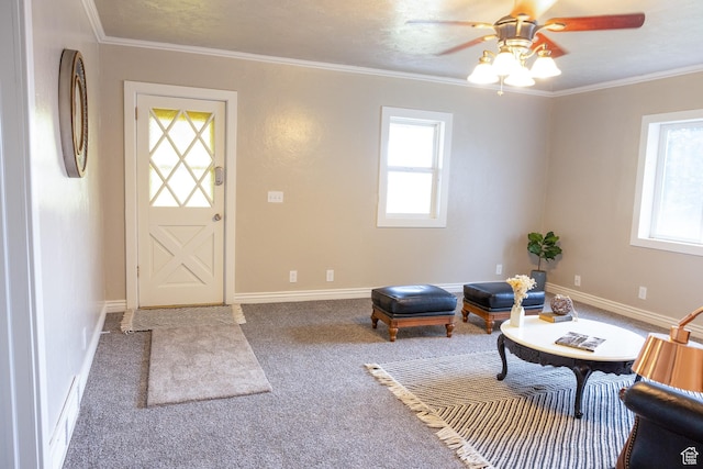 297 S 200 W, Richmond, UT 84333 - foyer with healthy amount of natural light, carpet flooring, ceiling fan, and crown molding