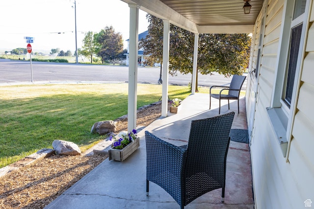297 S 200 W, Richmond, UT 84333 - covered porch featuring a yard