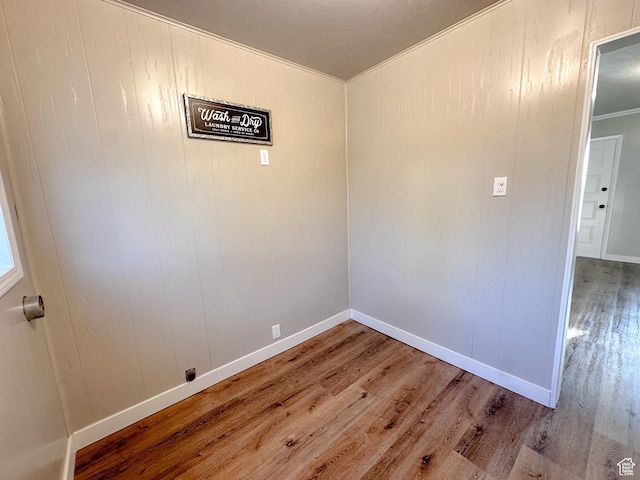 297 S 200 W, Richmond, UT 84333 - unfurnished room featuring wood finished floors and ornamental molding