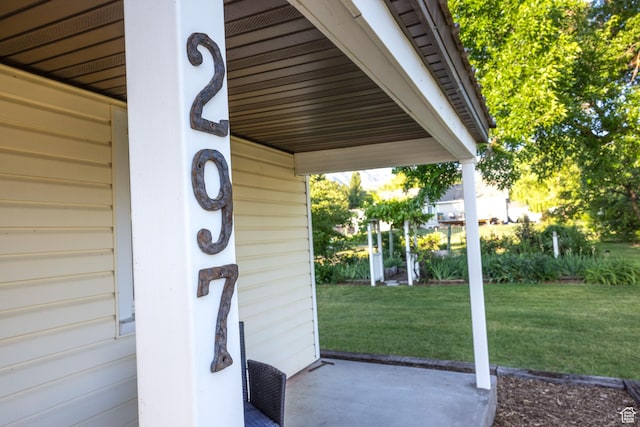 297 S 200 W, Richmond, UT 84333 - doorway to property with a yard
