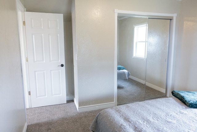 297 S 200 W, Richmond, UT 84333 - carpeted bedroom featuring a closet and baseboards