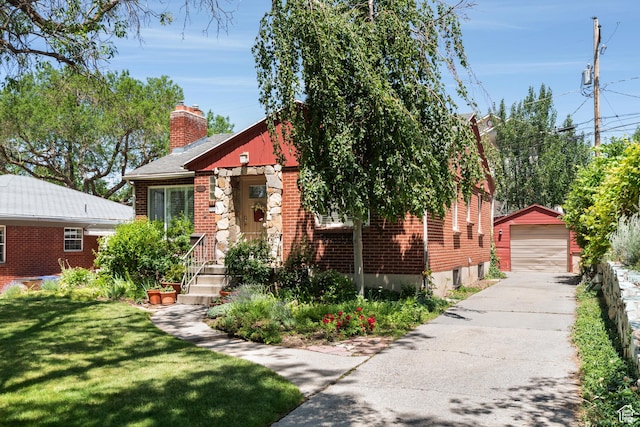 2359 E Bryan Ave S, Salt Lake City, UT 84108 - bungalow-style home featuring a garage, a chimney, brick siding, and an outdoor structure