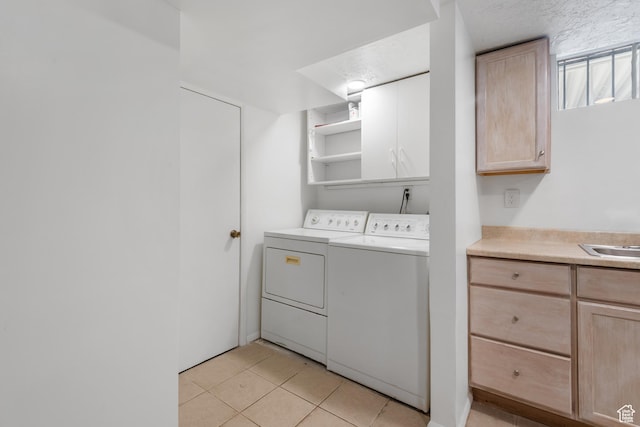 2359 E Bryan Ave S, Salt Lake City, UT 84108 - laundry room with cabinet space, separate washer and dryer, and light tile patterned floors