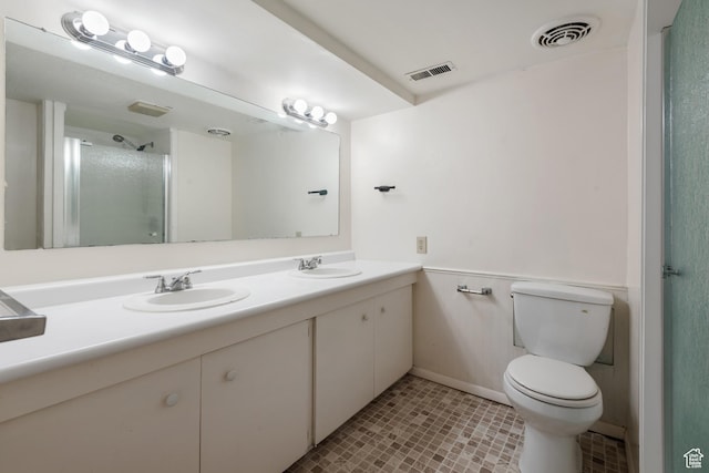 2359 E Bryan Ave S, Salt Lake City, UT 84108 - full bath with double vanity, a shower with shower door, and tile patterned flooring