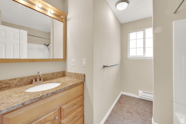 710 N 800 W Unit 11, Salt Lake City, UT 84116 - bathroom with vanity, a shower, and a baseboard radiator