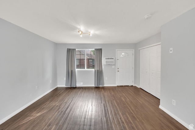 710 N 800 W Unit 11, Salt Lake City, UT 84116 - unfurnished living room with dark wood-style floors and a wall mounted AC