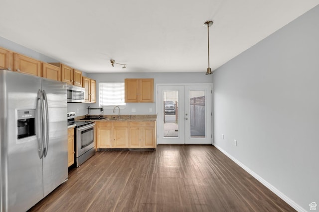 710 N 800 W Unit 11, Salt Lake City, UT 84116 - kitchen with stainless steel appliances, light brown cabinetry, dark wood-type flooring, light countertops, and pendant lighting