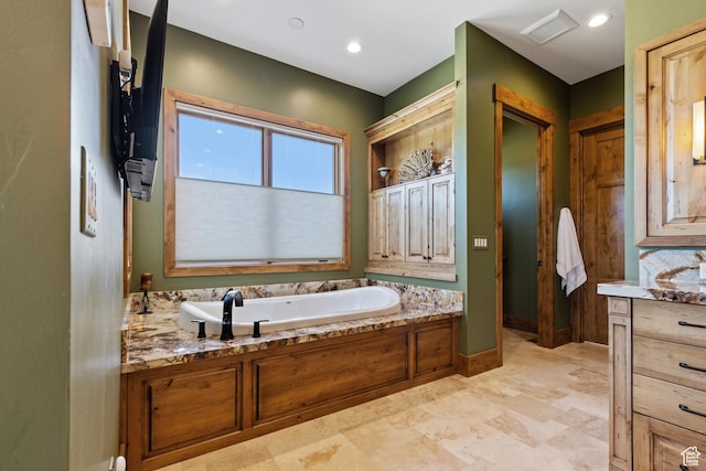 3911 N Zermatt St, Eden, UT 84310 - full bathroom with a garden tub and baseboards
