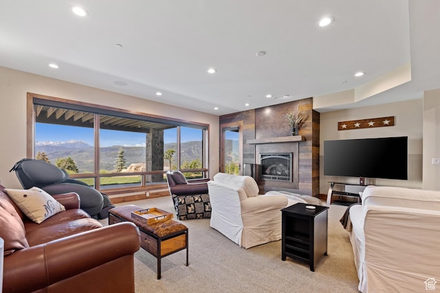 3911 N Zermatt St, Eden, UT 84310 - living room featuring light carpet, recessed lighting, and a fireplace