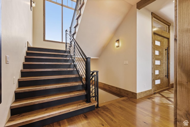 3911 N Zermatt St, Eden, UT 84310 - staircase featuring wood finished floors and baseboards