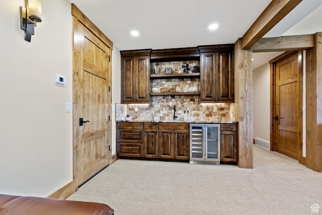 3911 N Zermatt St, Eden, UT 84310 - indoor wet bar with wine cooler, light carpet, tasteful backsplash, and recessed lighting