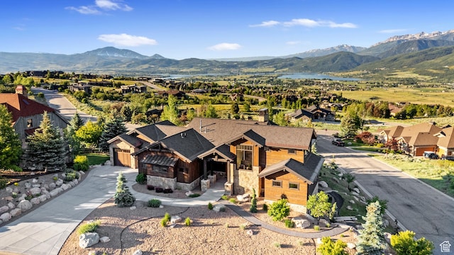 3911 N Zermatt St, Eden, UT 84310 - aerial view of residential area featuring a mountain backdrop
