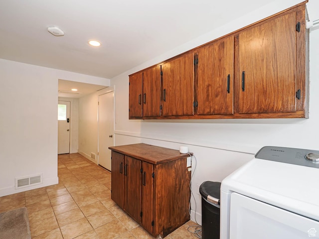 4601 S Creekview Cir, Murray, UT 84107 - washroom featuring washer / clothes dryer, cabinet space, recessed lighting, and light tile patterned floors