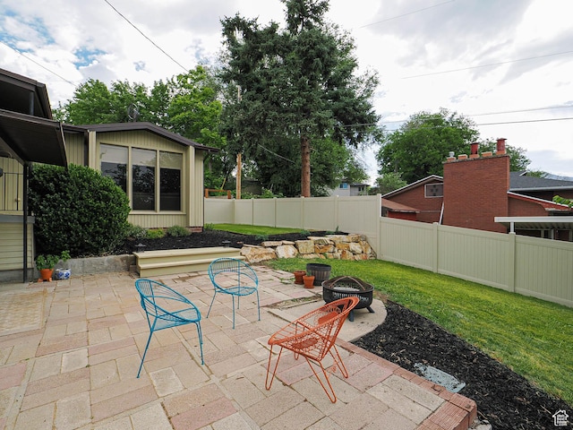 4601 S Creekview Cir, Murray, UT 84107 - view of patio / terrace featuring an outdoor fire pit