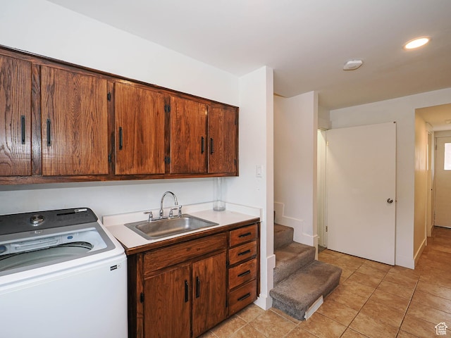 4601 S Creekview Cir, Murray, UT 84107 - washroom featuring washer / dryer, cabinet space, and light tile patterned flooring