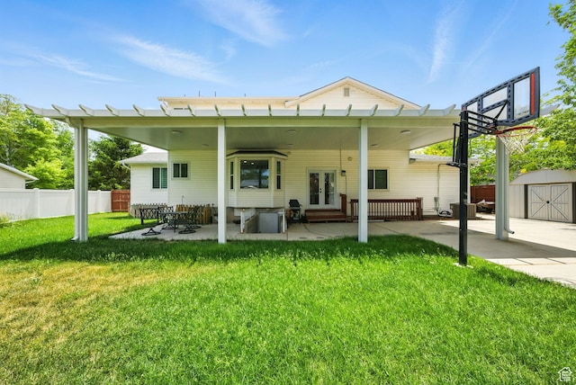 3474 W 7520 S, West Jordan, UT 84084 - back of property with french doors, a shed, and a patio area