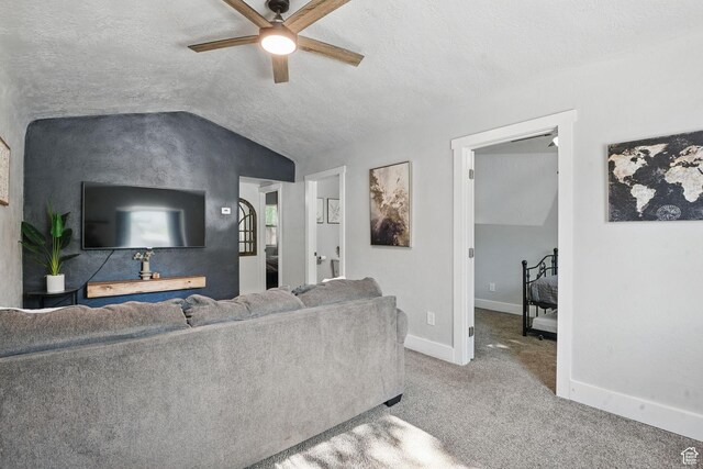 2973 Adams Ave, Ogden, UT 84403 - living area with ceiling fan, lofted ceiling, carpet, and a textured ceiling