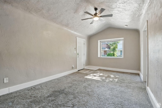 2973 Adams Ave, Ogden, UT 84403 - carpeted spare room featuring ceiling fan, vaulted ceiling, and a textured ceiling