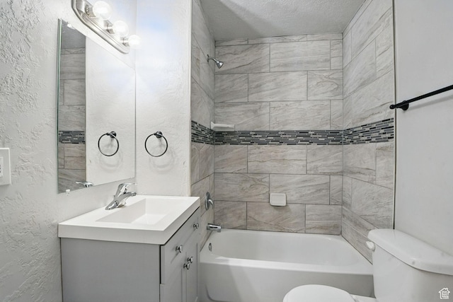 2973 Adams Ave, Ogden, UT 84403 - bathroom with a textured wall, vanity, and bathing tub / shower combination
