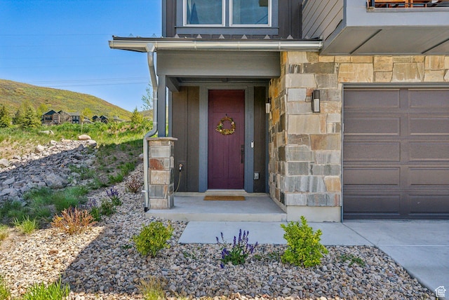 12756 N Belaview Way, Hideout, UT 84036 - property entrance featuring stone siding and a mountain view