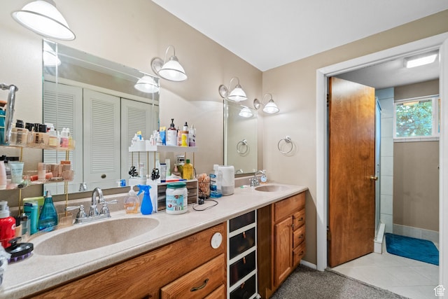 785 N 200 E, Tremonton, UT 84337 - bathroom with double vanity, tile patterned floors, a closet, and a shower