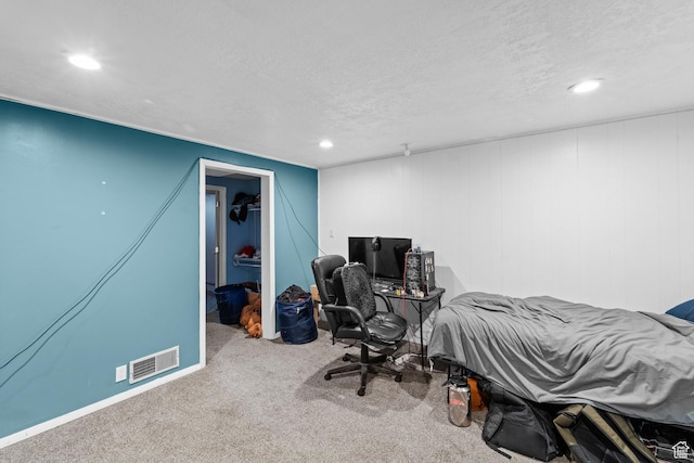 785 N 200 E, Tremonton, UT 84337 - carpeted bedroom featuring recessed lighting, a spacious closet, a textured ceiling, and a desk