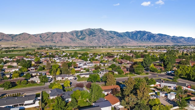 785 N 200 E, Tremonton, UT 84337 - aerial overview of property's location featuring mountains and nearby suburban area