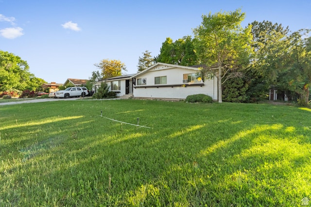 785 N 200 E, Tremonton, UT 84337 - view of front facade featuring a front lawn
