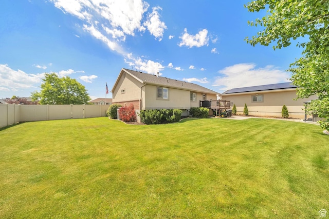 1295 S 4050 W, Syracuse, UT 84075 - rear view of house featuring a fenced backyard and stucco siding
