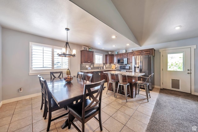 1295 S 4050 W, Syracuse, UT 84075 - dining room with recessed lighting, light tile patterned floors, a chandelier, and vaulted ceiling