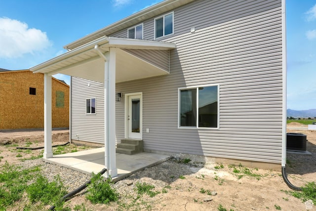1154 E 1150 S, Garland, UT 84312 - back of property with entry steps and a patio