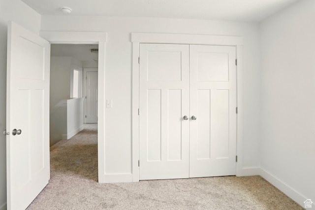 1154 E 1150 S, Garland, UT 84312 - unfurnished bedroom featuring carpet floors and a closet