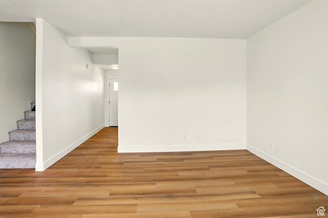 1154 E 1150 S, Garland, UT 84312 - empty room featuring stairs and light wood finished floors