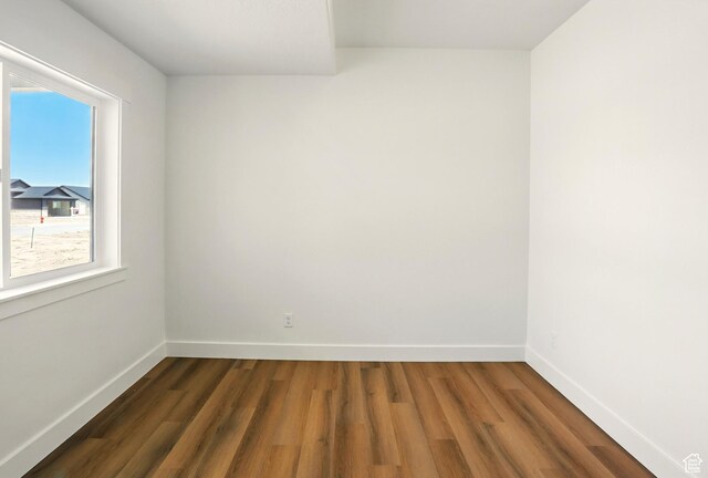 1154 E 1150 S, Garland, UT 84312 - spare room with wood finished floors